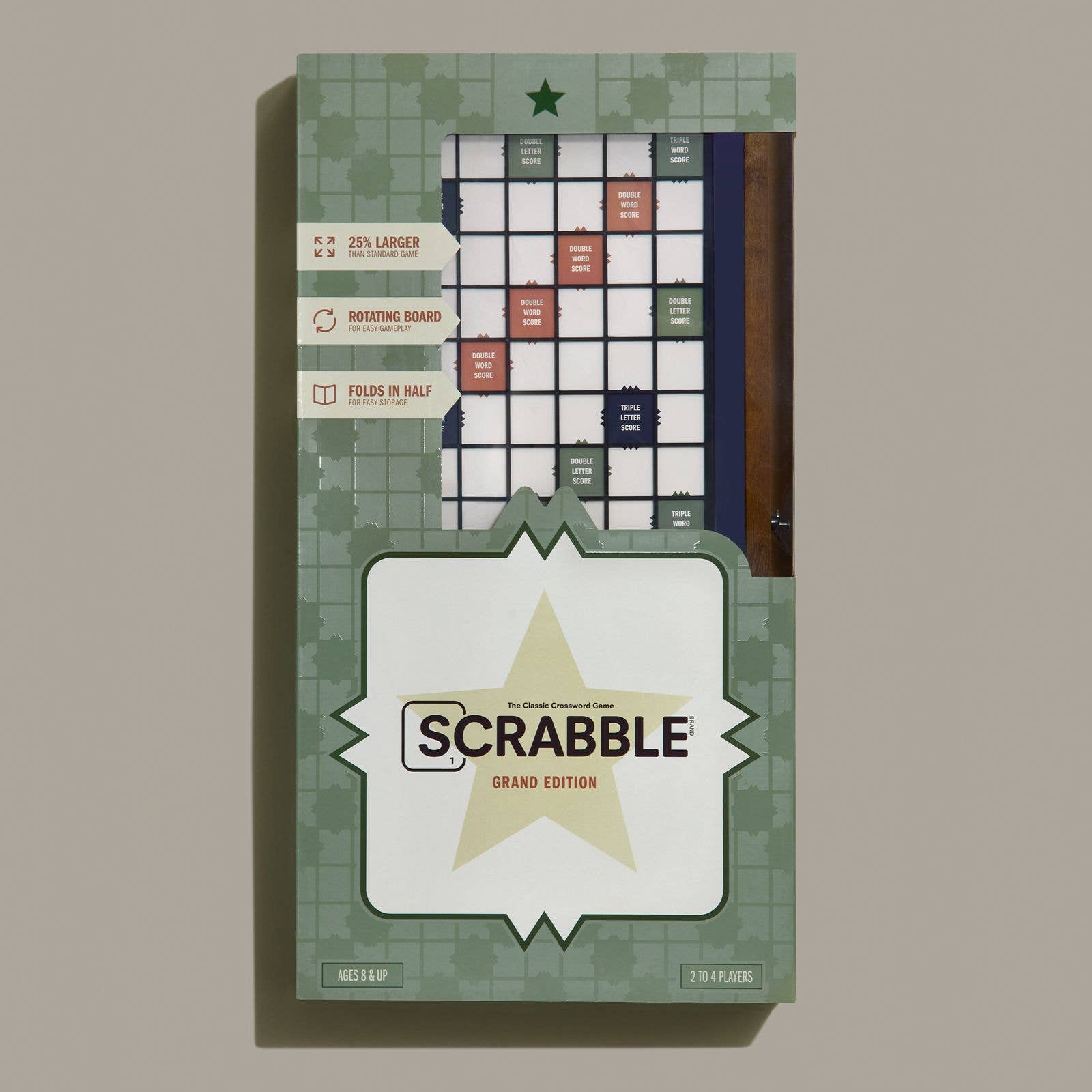 Scrabble Grand Folding Edition on a green background at Addison West