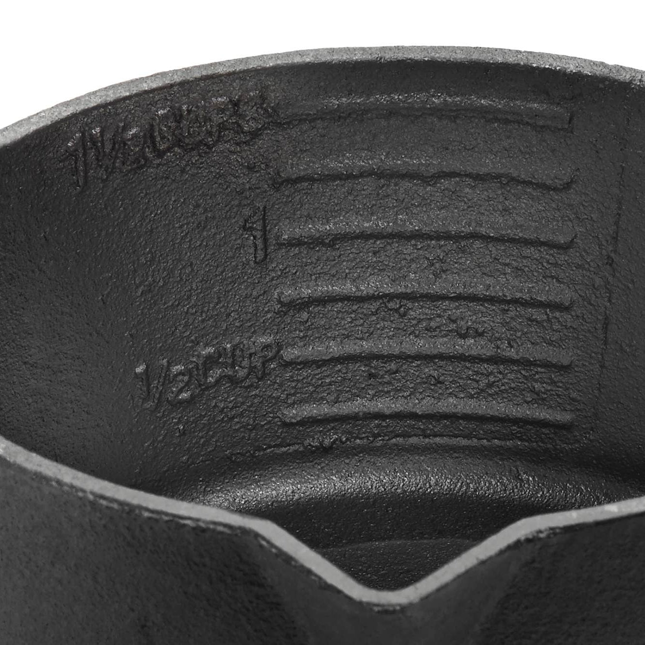 Cast Iron Sauce Pot with Basting Brush on a white background at Addison West