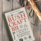 Bushcraft 101 by Dave Canterbury on wood table at Addison West