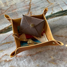 The Scrappy Catchall in Chestnut on a table at Addison West