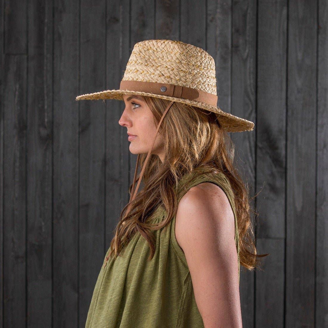Skiff Sun Hat in Natural on model at the Addison West.