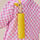 Original Duckhead Signature Yellow Eco-Friendly Umbrella on a beige background at Addison West