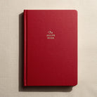 Red notebook titled 'The Recipe Book' on a beige background