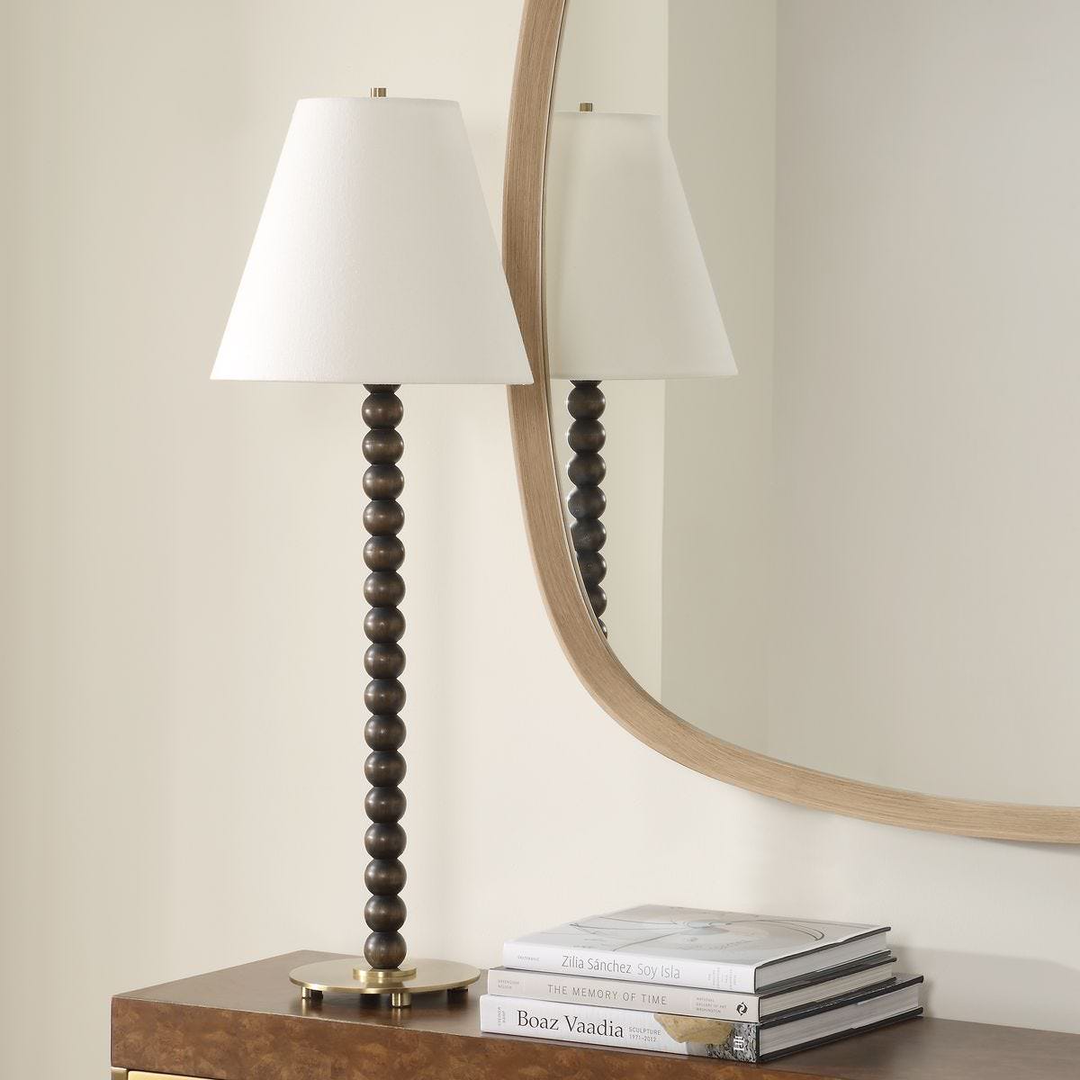 Gavine Table Lamp with dark walnut spheres on a console table at Addison West
