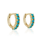 Elena Turquoise Huggies in Gold on a white background at Addison West