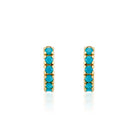 Elena Turquoise Huggies in Gold on a white background at Addison West