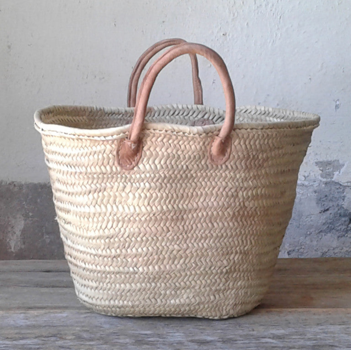 French Market Basket Tote on a table at Addison West