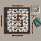 Scrabble Grand Folding Edition on a green background at Addison West