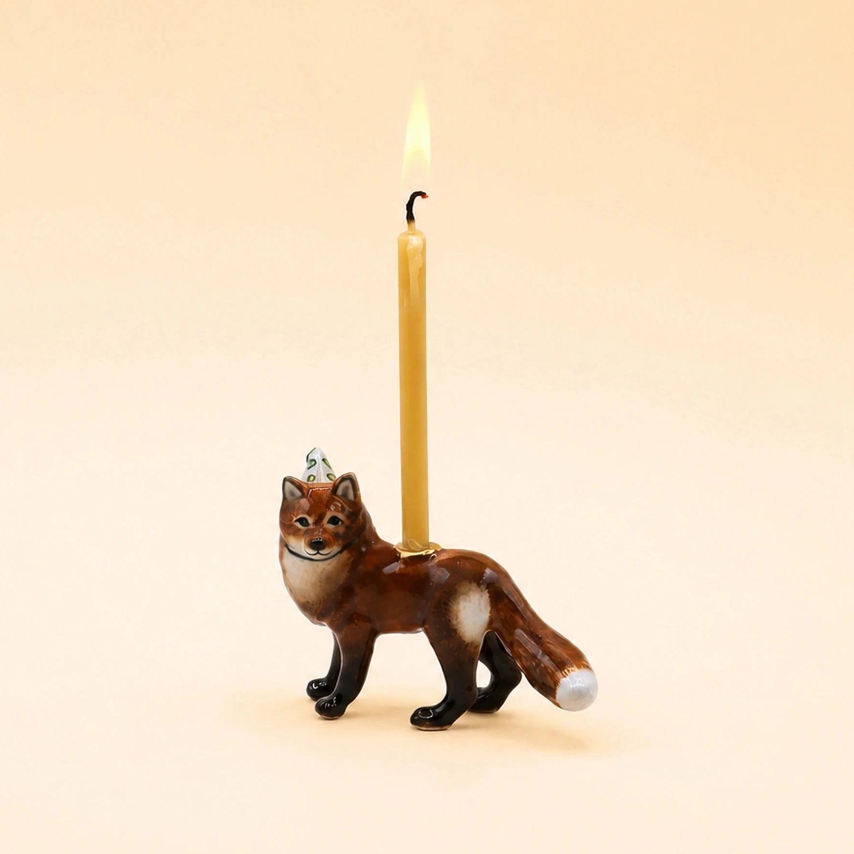 Camp Hollow Red Fox Cake Topper on a beige background at Addison West