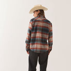 Male model wearing the Brixton Men's Bowery Flannel in Multi Shadow on plain background.