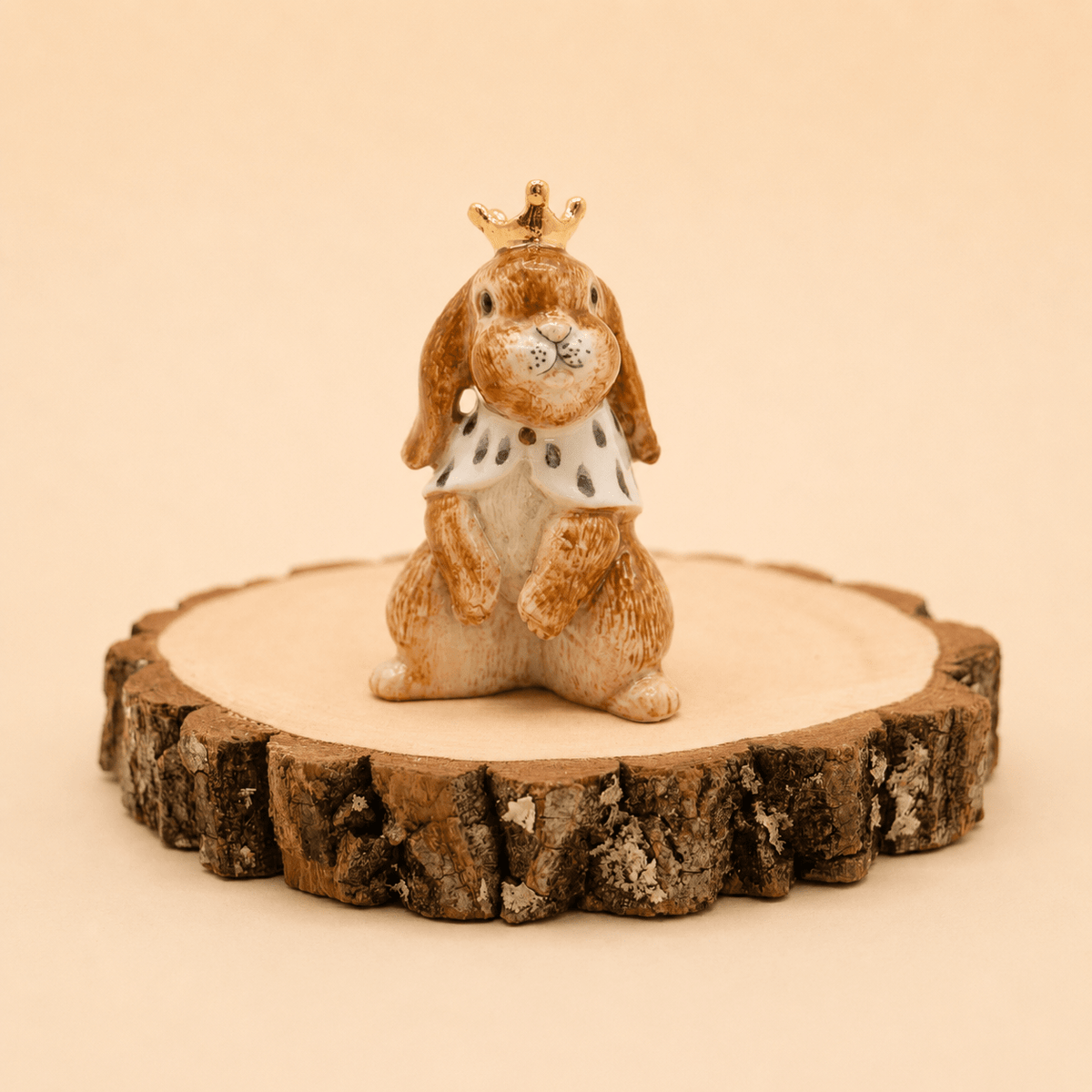 Camp Hollow Highness Hare Cake Topper on a beige background at Addison West