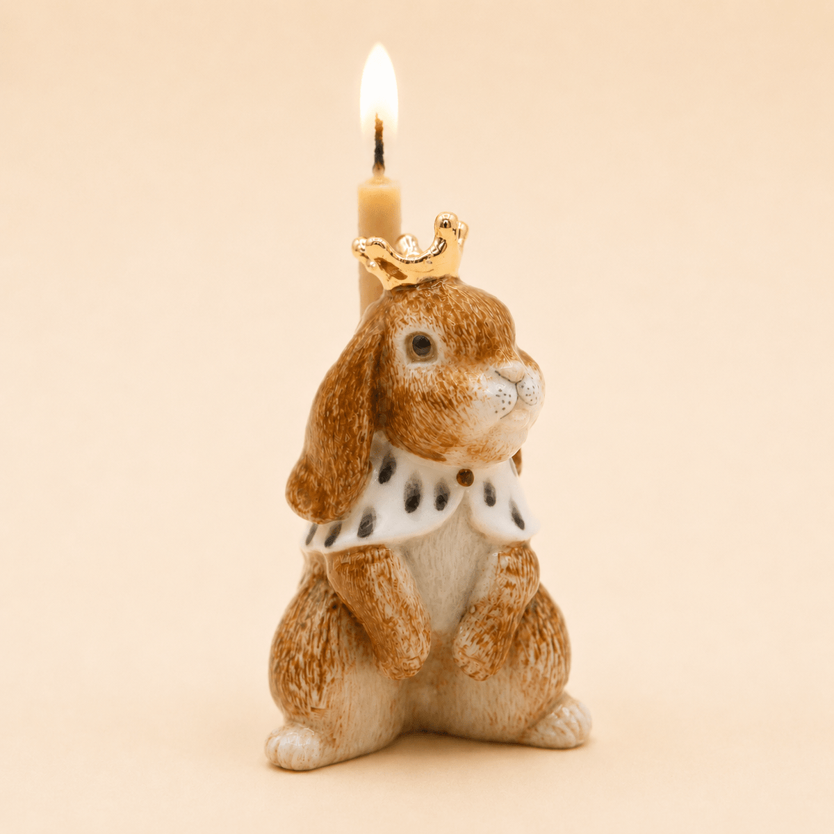 Camp Hollow Highness Hare Cake Topper on a beige background at Addison West