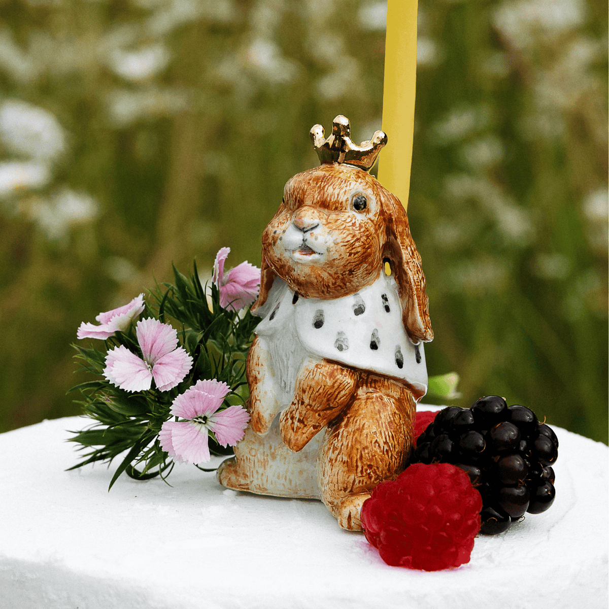 Camp Hollow Highness Hare Cake Topper on a cake at Addison West