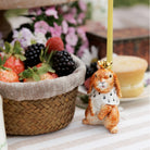Camp Hollow Highness Hare Cake Topper on a table at Addison West
