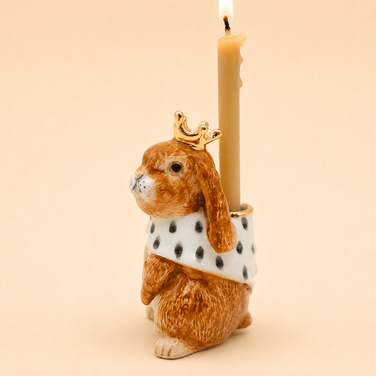 Camp Hollow Highness Hare Cake Topper on a beige background at Addison West