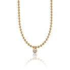 Juliette Gold Ball Necklace on a white background at Addison West