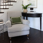 Woodbridge Furniture Salutation Demilune Table in Worn Black Finish on a white wall at Addison West