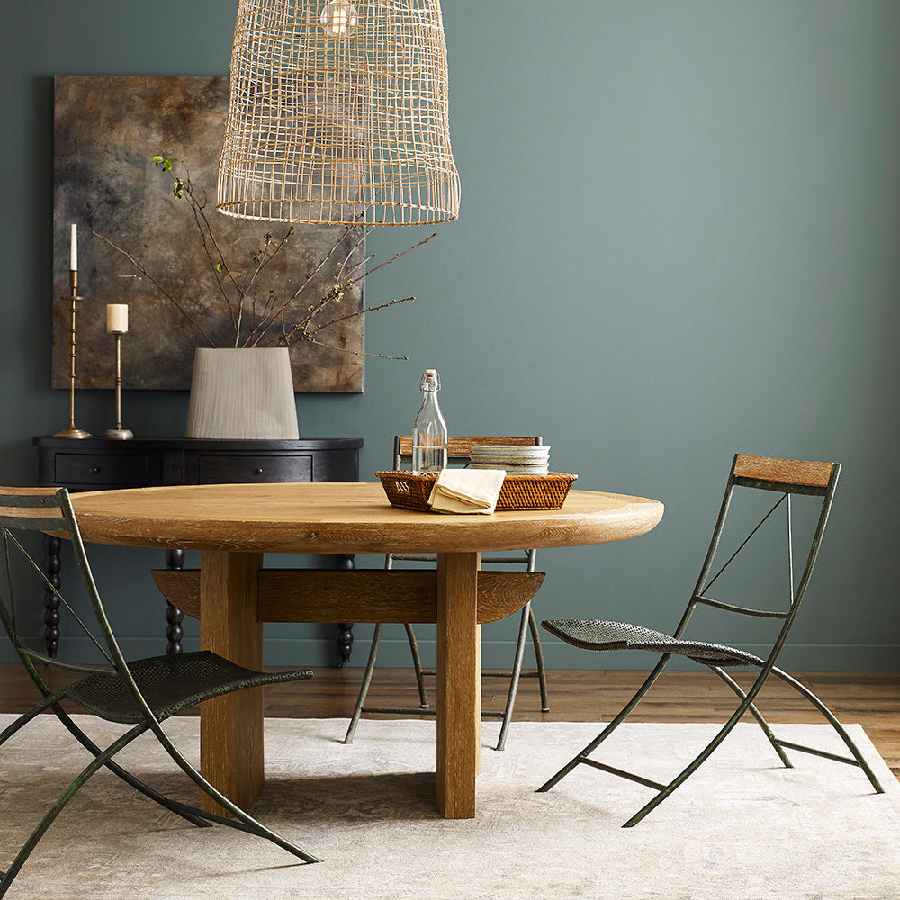 Woodbridge Furniture Salutation Demilune Table in Worn Black Finish in a green dining room at Addison West