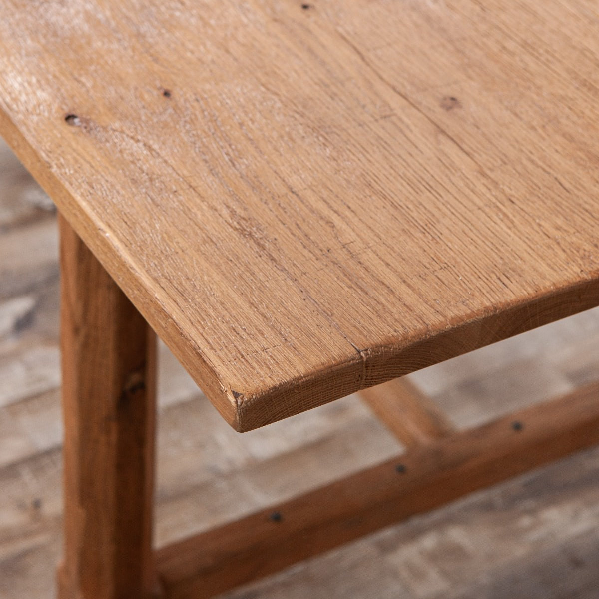 Close up of Forever Extendable Dining Table in Breadboard Finish in a dining room at Addison West