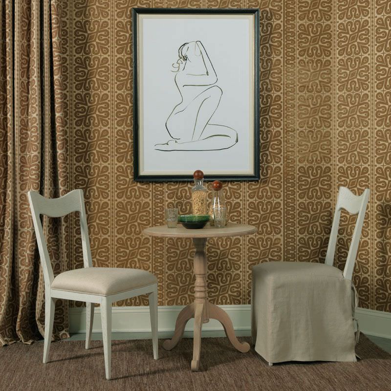 Woodbridge Absolute Pedestal Table styled as a small dining table with two chairs at Addison West