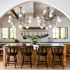 Fable Counter Stool in Worn Black Finish at a counter in a kitchen at Addison West