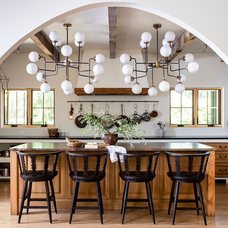 Fable Counter Stool in Worn Black Finish at a counter in a kitchen at Addison West