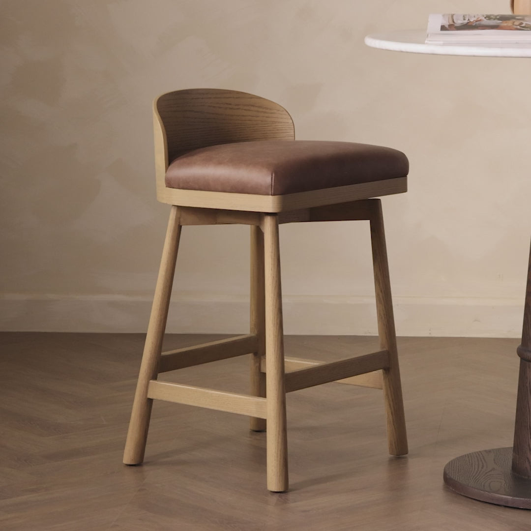Video of Four Hands Cloris Swivel Counter Stool in Palermo Cigar in dining room at Addison West.