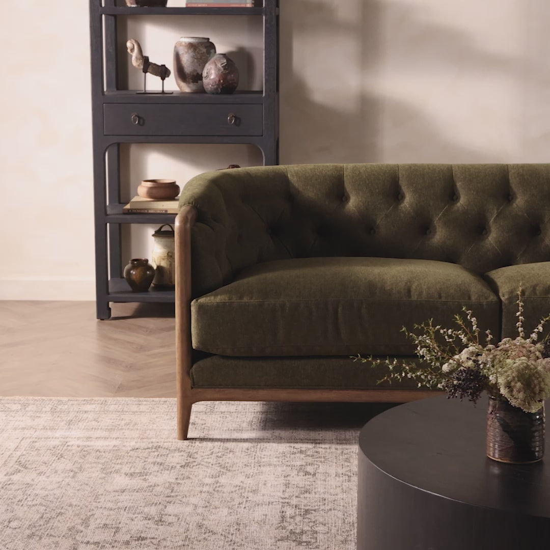 Four Hands Ellsworth Sofa in Sutton Olive in a living room at Addison West