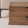 Four Hands Arizona Trunk in Weathered Oak in a bedroom at Addison West