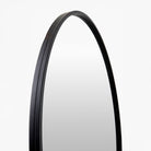 Close up of Carmen Accent Mirror on a white background at Addison West