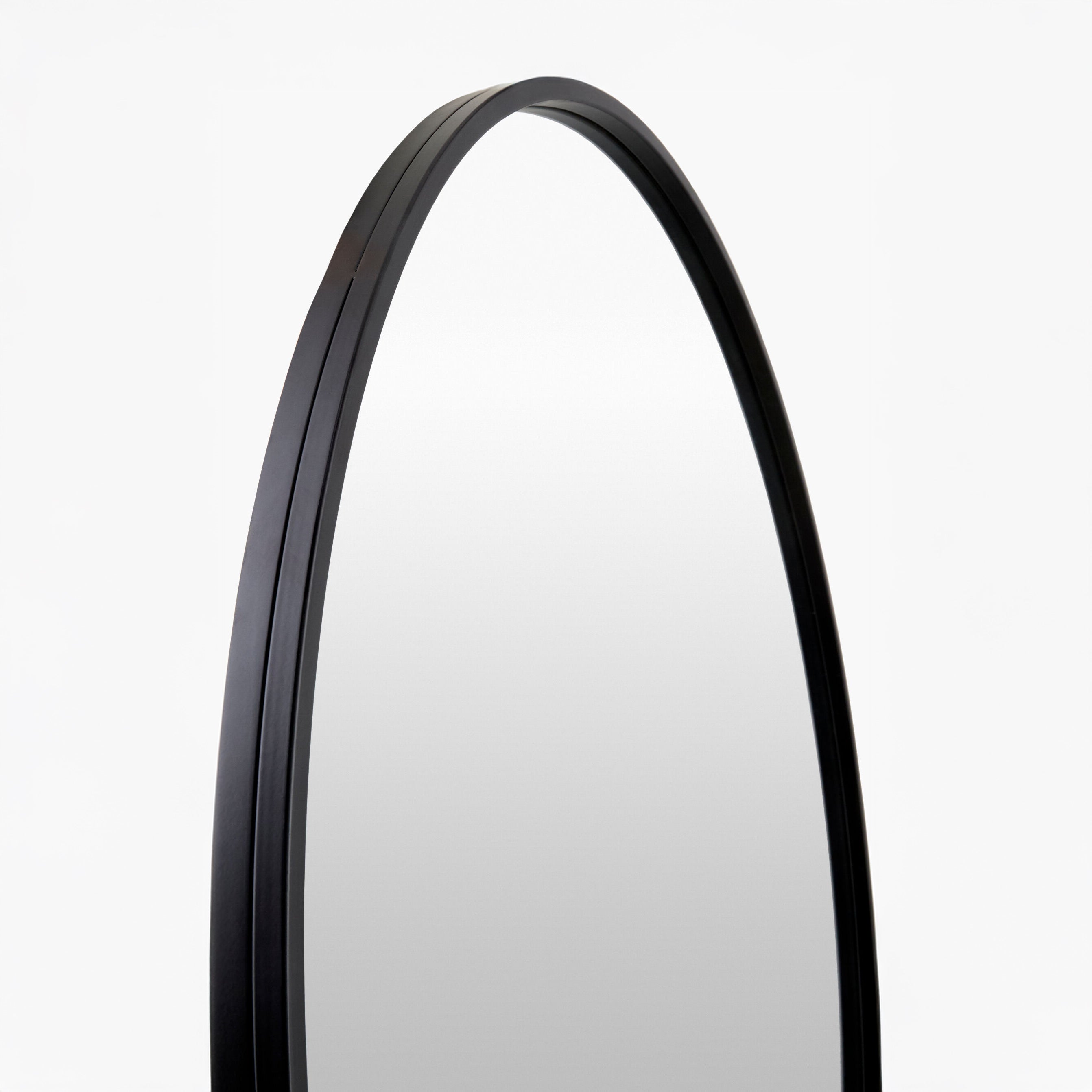 Close up of Carmen Accent Mirror on a white background at Addison West