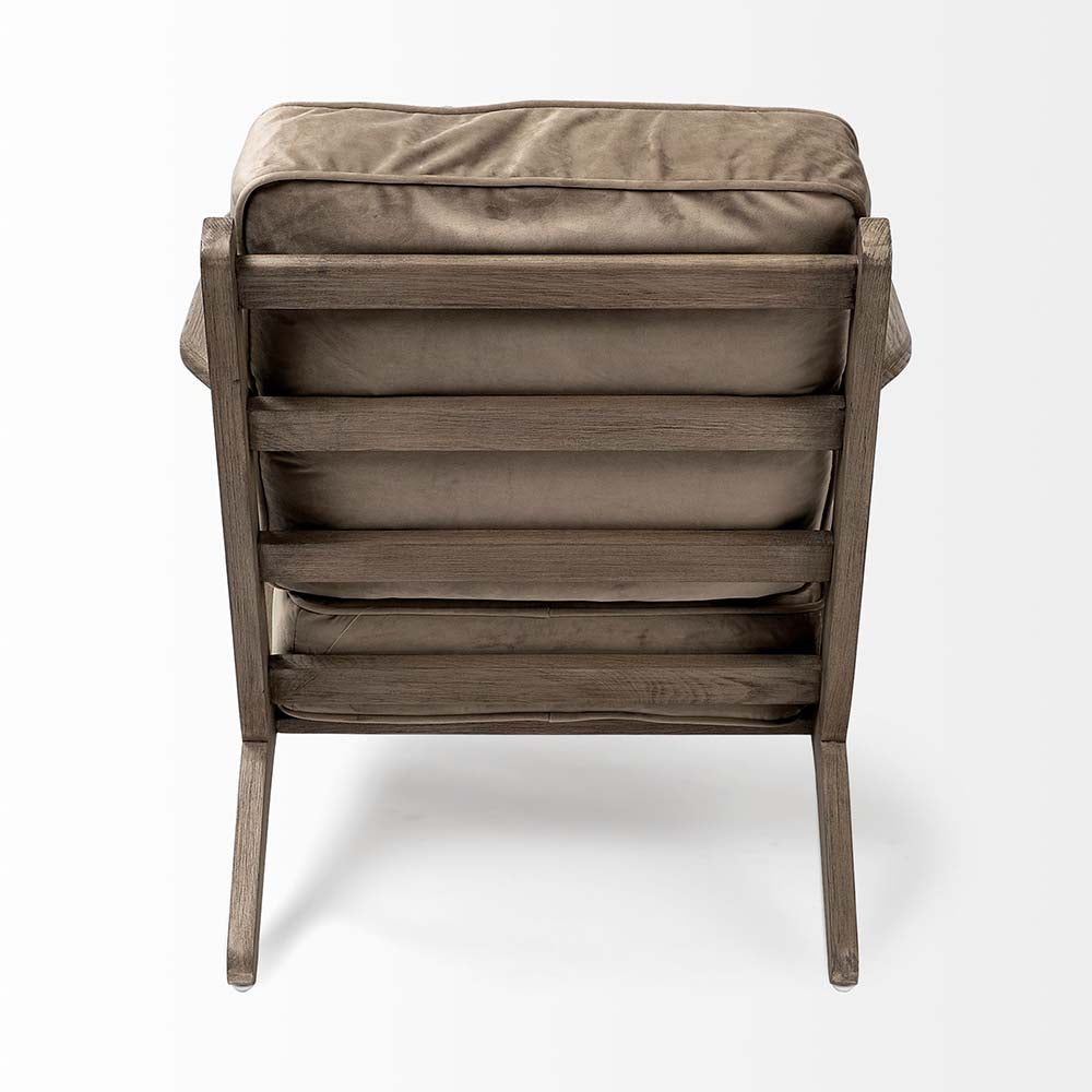 Wood arm chair with dark brown stain and olive velvet removable cushions on a white background