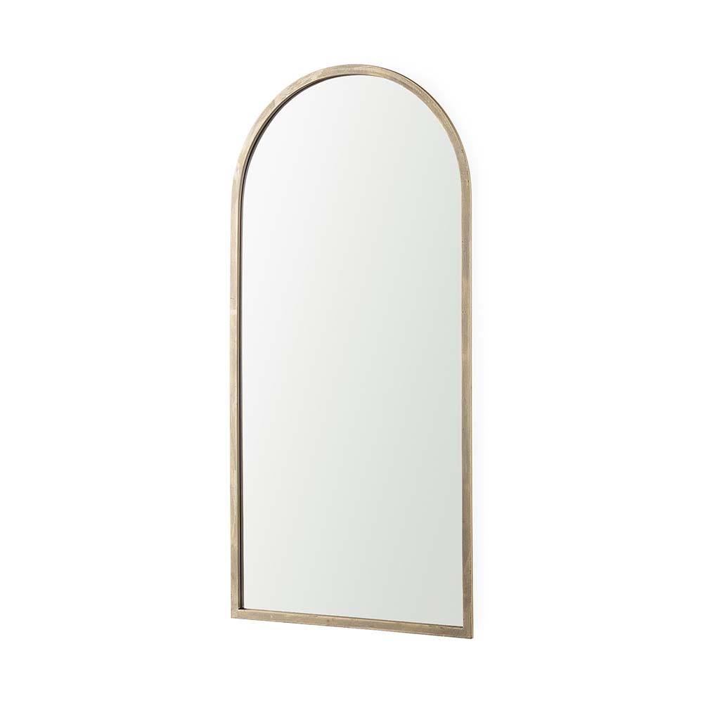 Arched top wall mirror with brushed gold finish on a white background 