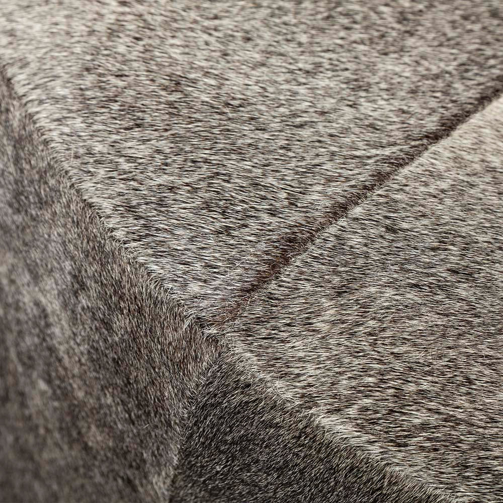 Close up of round hide on hair ottoman