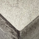 Close up of hair on hide ottoman 