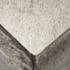 Close up of hair on hide ottoman 