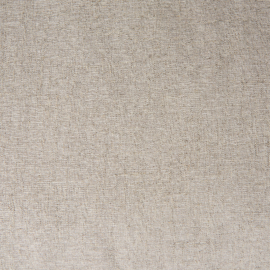 Armchair with dark brown stain and sloped arms and cane back and light beige cushions on a white background