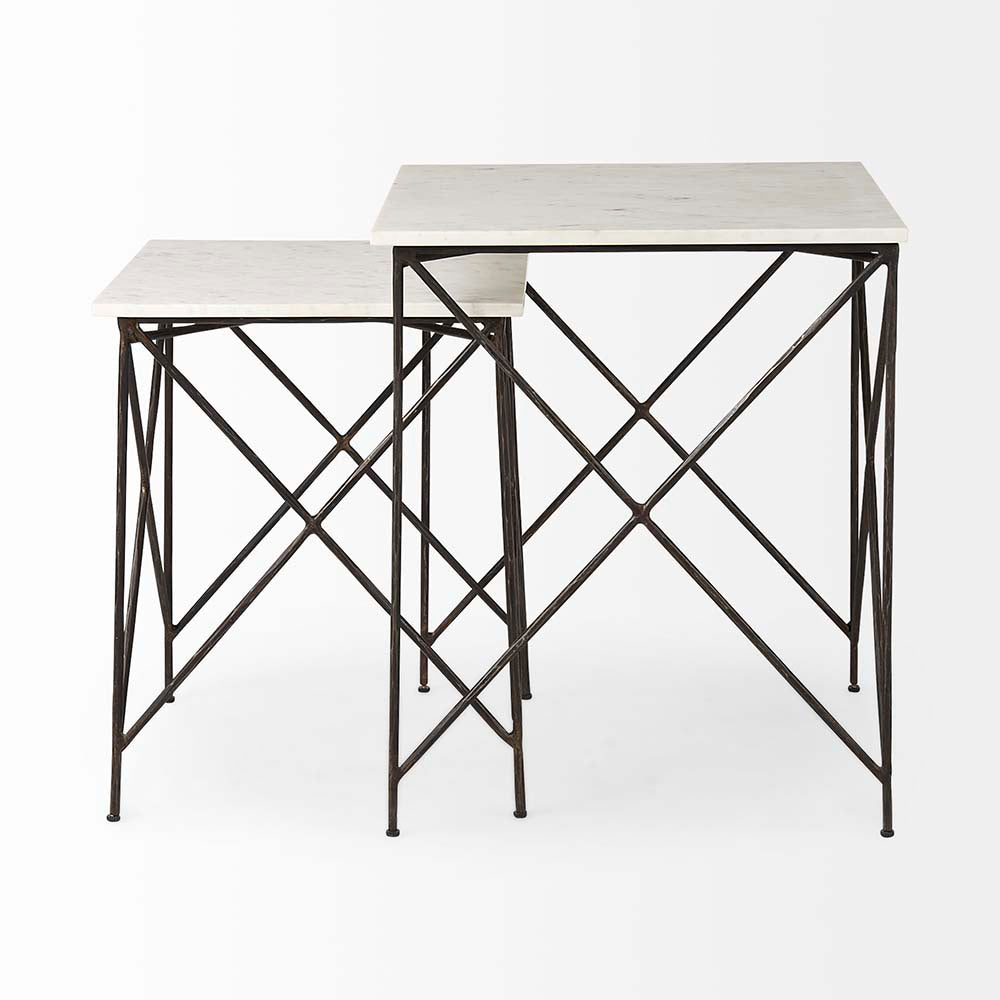 Set of two marble top nested tables with iron base on a white background