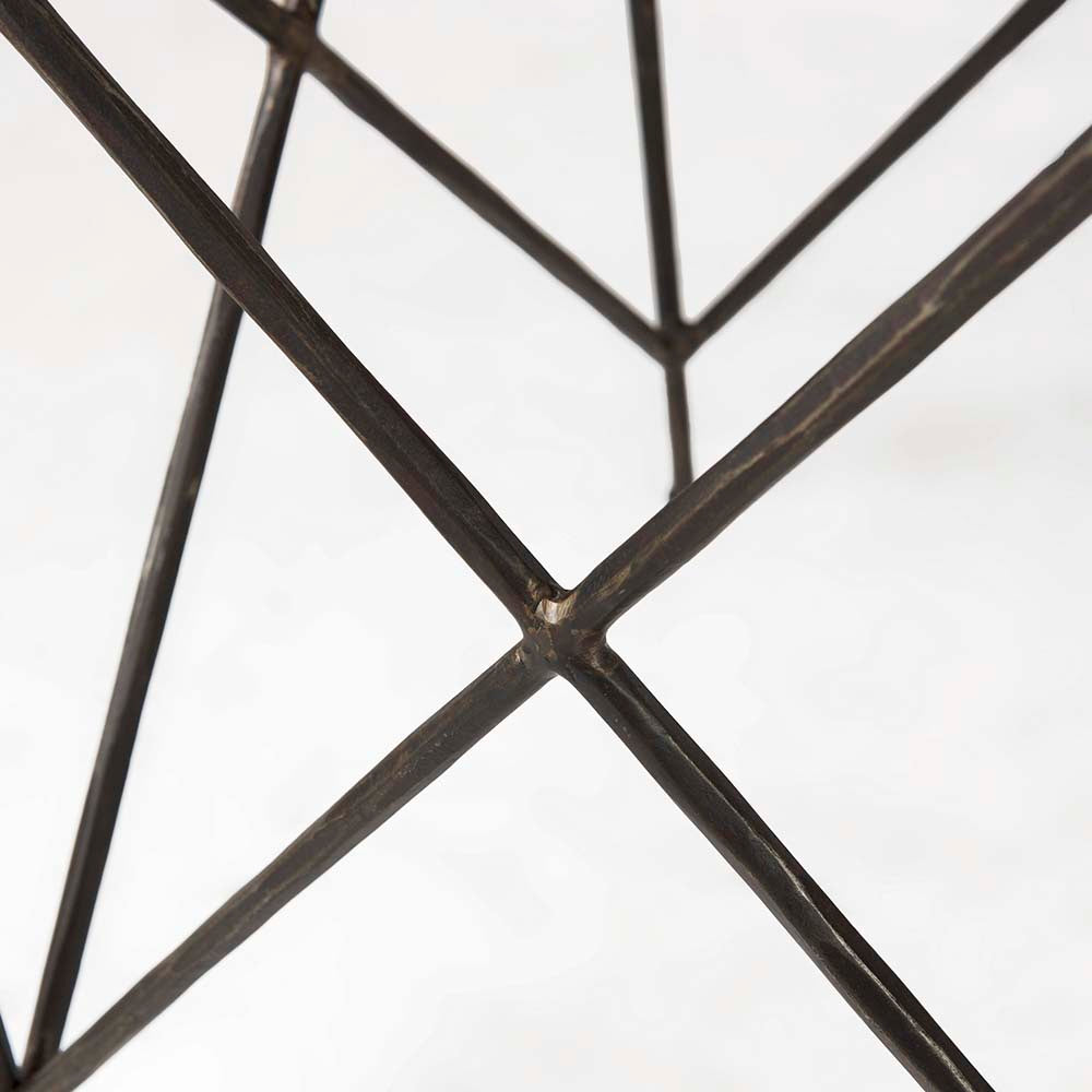 Set of two marble top nested tables with iron base on a white background