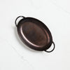Smithey carbon steel oval roaster on a white background