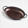 Smithey carbon steel oval roaster on a white background