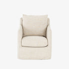 Four hands furniture brand Banks swivel chair in cambric ivory slipcover on a white background