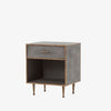 Grey shagreen nightstand with brass trim accents by four hands furniture on a white background