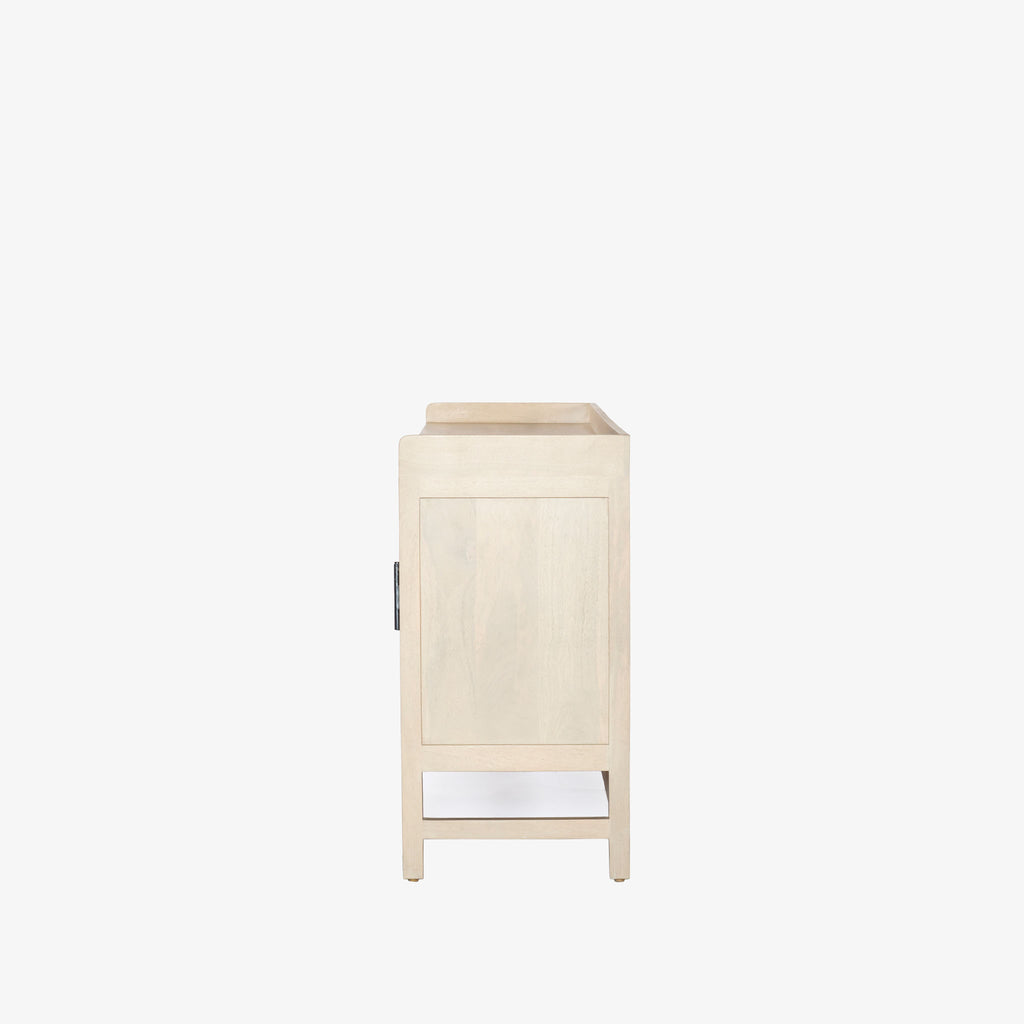 Side view of Four Hands Furniture brand caprice sideboard in light wood on a white background