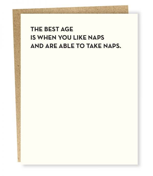 Sapling press white greeting card with saying “The best age is when you like naps and are able to take naps.”