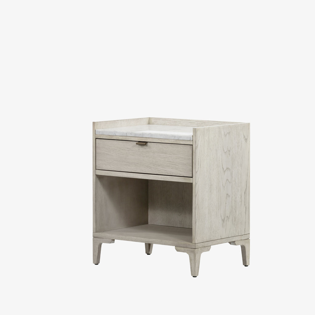 Whitewashed nightstand with drawer and marble top on a white background