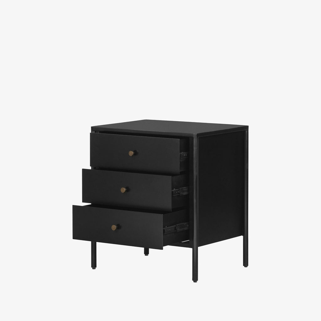 Black three drawer 'Soto' nightstand by four hands furniture with drawers open on a white background