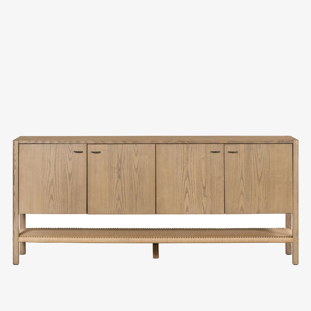 Wood four door 'Zuma' sideboard with shelf underneath by four hands furniture on a white background