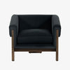 Four Hands Furniture brand Cairo chair in dark blue velvet with dark wood legs on a white background