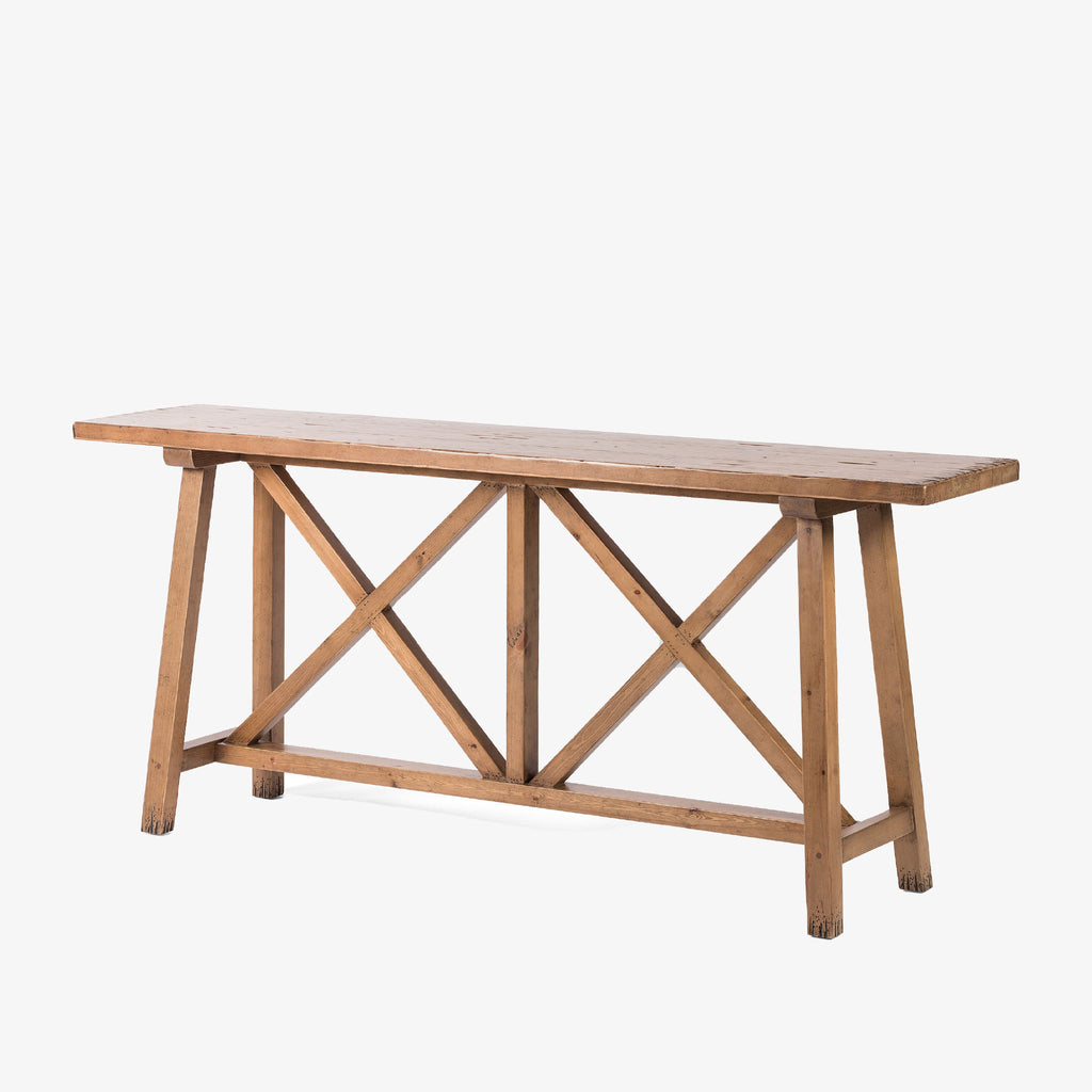 Waxed pine 'Trellis' console table by four hands furniture on a white background